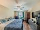 Spacious bedroom featuring hardwood floors and a ceiling fan at 1311 Primrose View Cir, Lawrenceville, GA 30044