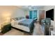 Spacious bedroom featuring hardwood floors and a ceiling fan at 1311 Primrose View Cir, Lawrenceville, GA 30044