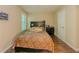 Cozy bedroom with natural light, neutral walls, and a comfortable bed, creating a relaxing atmosphere at 1311 Primrose View Cir, Lawrenceville, GA 30044