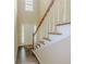 Welcoming foyer with hardwood floors, staircase, and plenty of natural light at 1311 Primrose View Cir, Lawrenceville, GA 30044