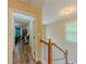 Hallway with hardwood floors looking into bedroom at 1311 Primrose View Cir, Lawrenceville, GA 30044