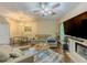 Spacious living area with a fireplace, comfortable seating, and an open layout at 1311 Primrose View Cir, Lawrenceville, GA 30044