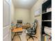 Functional office space featuring a work station, rolling chair, and storage with an efficient layout at 1311 Primrose View Cir, Lawrenceville, GA 30044