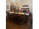 A dining room featuring a wooden table and chairs at 408 Hasty Trl, Canton, GA 30115
