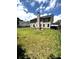 Spacious backyard with a fire pit and plenty of room to relax and entertain at 7178 Glaspie Way, Atlanta, GA 30349
