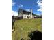 Large fenced backyard provides ample space for outdoor activities at 7178 Glaspie Way, Atlanta, GA 30349