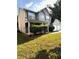 Two-story home with covered porch and two car garage at 7178 Glaspie Way, Atlanta, GA 30349
