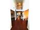 Elegant foyer with hardwood floors and high ceilings and second floor view at 7178 Glaspie Way, Atlanta, GA 30349