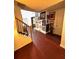 View of wall featuring art, hard wood floors and staircase at 7178 Glaspie Way, Atlanta, GA 30349