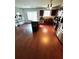 Kitchen with stainless steel appliances, wooden cabinets, and hardwood floors at 7178 Glaspie Way, Atlanta, GA 30349