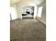 Main bedroom with sitting area, fire place, and large window for natural light at 7178 Glaspie Way, Atlanta, GA 30349