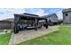 Well-maintained backyard featuring a paved patio with gazebo, ideal for outdoor enjoyment at 2410 Melton Common Dr, Dacula, GA 30019