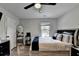 Comfortable bedroom featuring neutral walls, stylish decor, and a ceiling fan at 2410 Melton Common Dr, Dacula, GA 30019