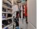 Walk-in closet with built-in shelving, drawers, and hanging racks, providing ample storage at 2410 Melton Common Dr, Dacula, GA 30019