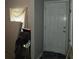 A cluttered bedroom corner with a mattress and a closed door at 3025 Butler Creek Nw Rd, Kennesaw, GA 30152