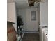 Laundry room with washer, dryer, and ceiling damage at 3025 Butler Creek Nw Rd, Kennesaw, GA 30152