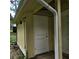 A rear view of the exterior of the shed at 3025 Butler Creek Nw Rd, Kennesaw, GA 30152