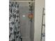 Shower featuring a marble tile wall at 3025 Butler Creek Nw Rd, Kennesaw, GA 30152