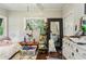 Bedroom with hardwood flooring, large window, and a spacious wardrobe at 428 Medlock Rd, Decatur, GA 30030