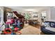 Open-concept living room connects to the kitchen, featuring hardwood floors and comfortable seating area at 428 Medlock Rd, Decatur, GA 30030