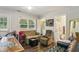 Comfortable living room with hardwood floors, natural light, and convenient access to the bathroom at 428 Medlock Rd, Decatur, GA 30030