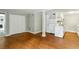 Open living space with hardwood flooring that adjoins an open concept kitchen at 428 Medlock Rd, Decatur, GA 30030