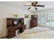 Bedroom with wooden furniture and a large window for plenty of natural light at 67 Middleton Se Ct, Smyrna, GA 30080
