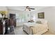Well-lit bedroom with lots of natural light and traditional-style furniture and decor at 67 Middleton Se Ct, Smyrna, GA 30080