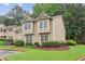 Charming two-story townhome with well-maintained lawn and landscaping at 67 Middleton Se Ct, Smyrna, GA 30080