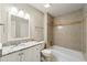 Full bathroom with tiled shower, granite vanity, and modern fixtures for a clean and updated look at 1386 Heritage Glen Dr, Marietta, GA 30068