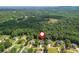 Beautiful aerial view of the neighborhood with lush trees surrounding the area at 516 Black Horse Cir, Canton, GA 30114