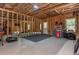 Spacious unfinished basement featuring exposed wood beams and open layout, offering potential for customization at 516 Black Horse Cir, Canton, GA 30114