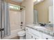 This full bath has a tub/shower combination and granite vanity at 516 Black Horse Cir, Canton, GA 30114