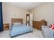Bedroom with carpet, large window, dresser and crib at 516 Black Horse Cir, Canton, GA 30114
