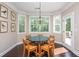 Cozy breakfast nook with large windows providing ample natural light and wooded views at 516 Black Horse Cir, Canton, GA 30114