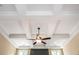 Detailed coffered ceiling with ceiling fan, adding architectural interest to the living space at 516 Black Horse Cir, Canton, GA 30114
