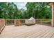 This is a spacious wooden deck offering a private outdoor space, perfect for grilling and relaxing at 516 Black Horse Cir, Canton, GA 30114