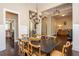 Open dining room area with hardwood floors and a view into the kitchen and living spaces at 516 Black Horse Cir, Canton, GA 30114