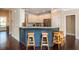 Eat-in kitchen with a large island featuring a granite countertop and stylish seating at 516 Black Horse Cir, Canton, GA 30114