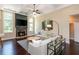 Inviting living room with fireplace, coffered ceilings, and ample natural light at 516 Black Horse Cir, Canton, GA 30114
