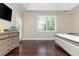 This main bedroom has hardwood floors, neutral walls and a tray ceiling at 516 Black Horse Cir, Canton, GA 30114