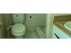 This functional bathroom has a toilet and sink at 6521 Menlo Way, Rex, GA 30273