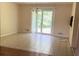 Bright dining room with sliding glass doors that provide ample natural light and access to the outdoors at 6521 Menlo Way, Rex, GA 30273