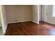 The living room features hardwood floors and a doorway at 6521 Menlo Way, Rex, GA 30273