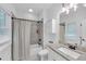 Clean bathroom featuring a shower-tub combination, sleek fixtures, and a modern vanity at 104 Woodland Ln, Canton, GA 30114
