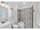 Cozy bathroom featuring a shower-tub combination, sleek fixtures, and modern vanity at 104 Woodland Ln, Canton, GA 30114