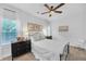 Well-lit bedroom featuring a comfortable bed, stylish furnishings, and tasteful décor at 104 Woodland Ln, Canton, GA 30114