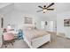 Bright bedroom features a comfortable bed, vanity area, and plenty of natural light at 104 Woodland Ln, Canton, GA 30114