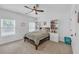 Inviting bedroom with a cozy bed, ample natural light, and built-in shelving for books and décor at 104 Woodland Ln, Canton, GA 30114