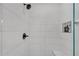 Sleek walk-in shower with modern tile and fixtures, offering a luxurious and refreshing experience at 104 Woodland Ln, Canton, GA 30114